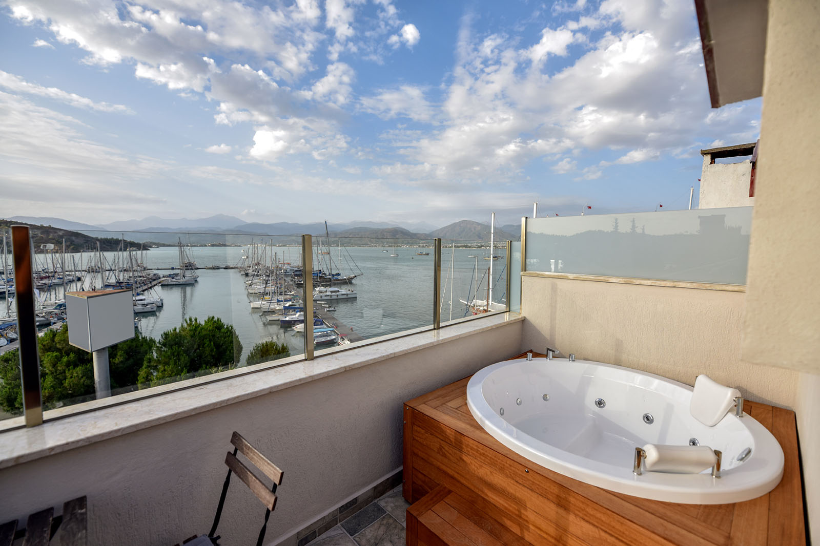 Lafarine Rooms — terrace with jacuzzi and marina view